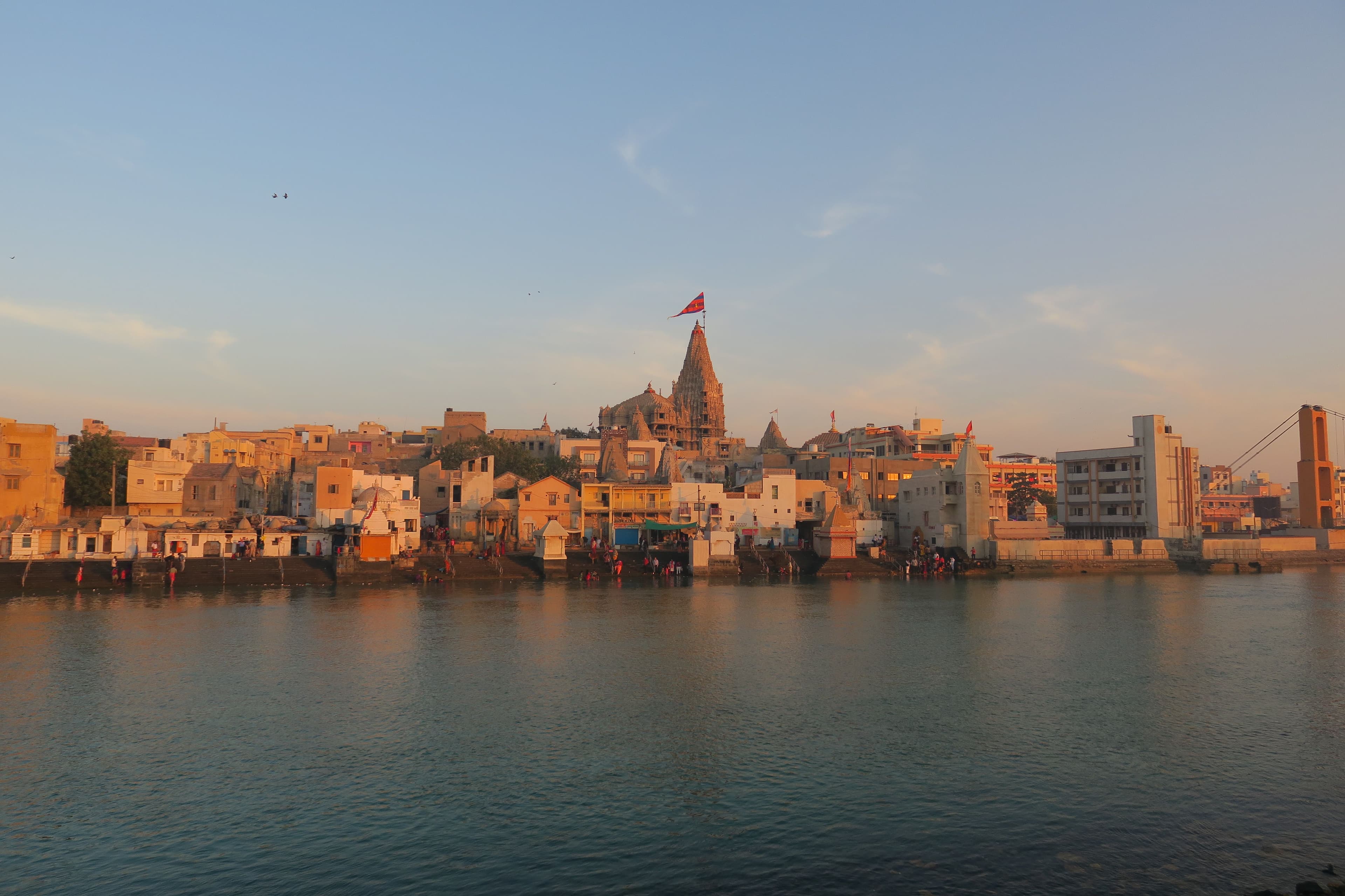 Golden temple architecture at Dwarka beside the water